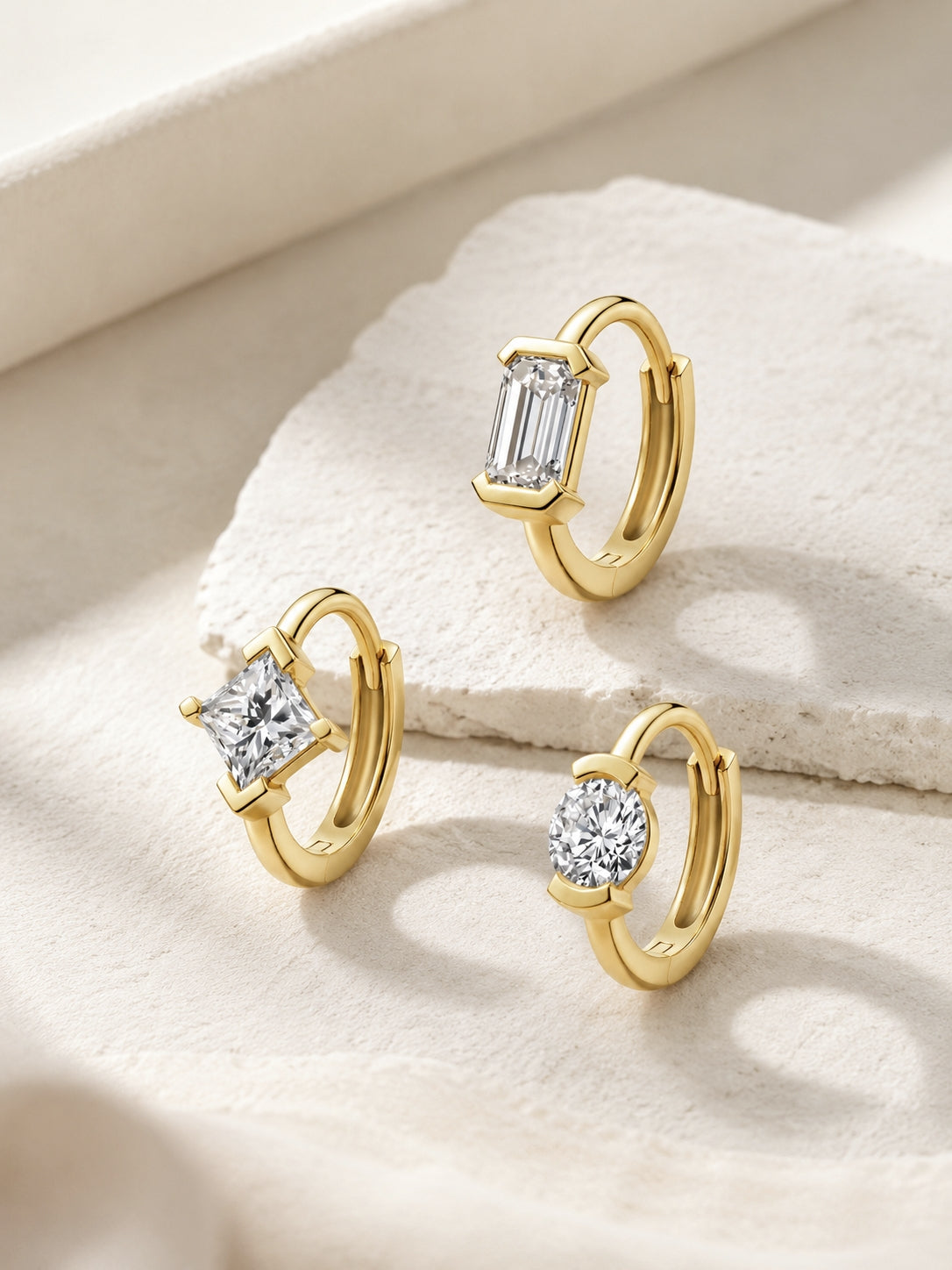 The Radiance Emerald Diamond Huggie Hoops