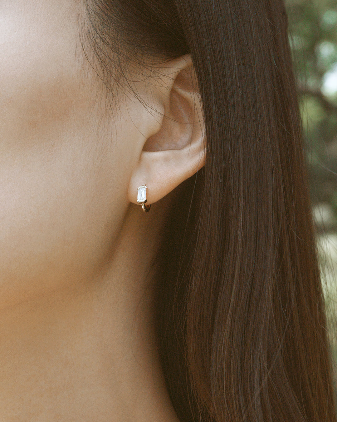 The Radiance Emerald Diamond Huggie Hoops