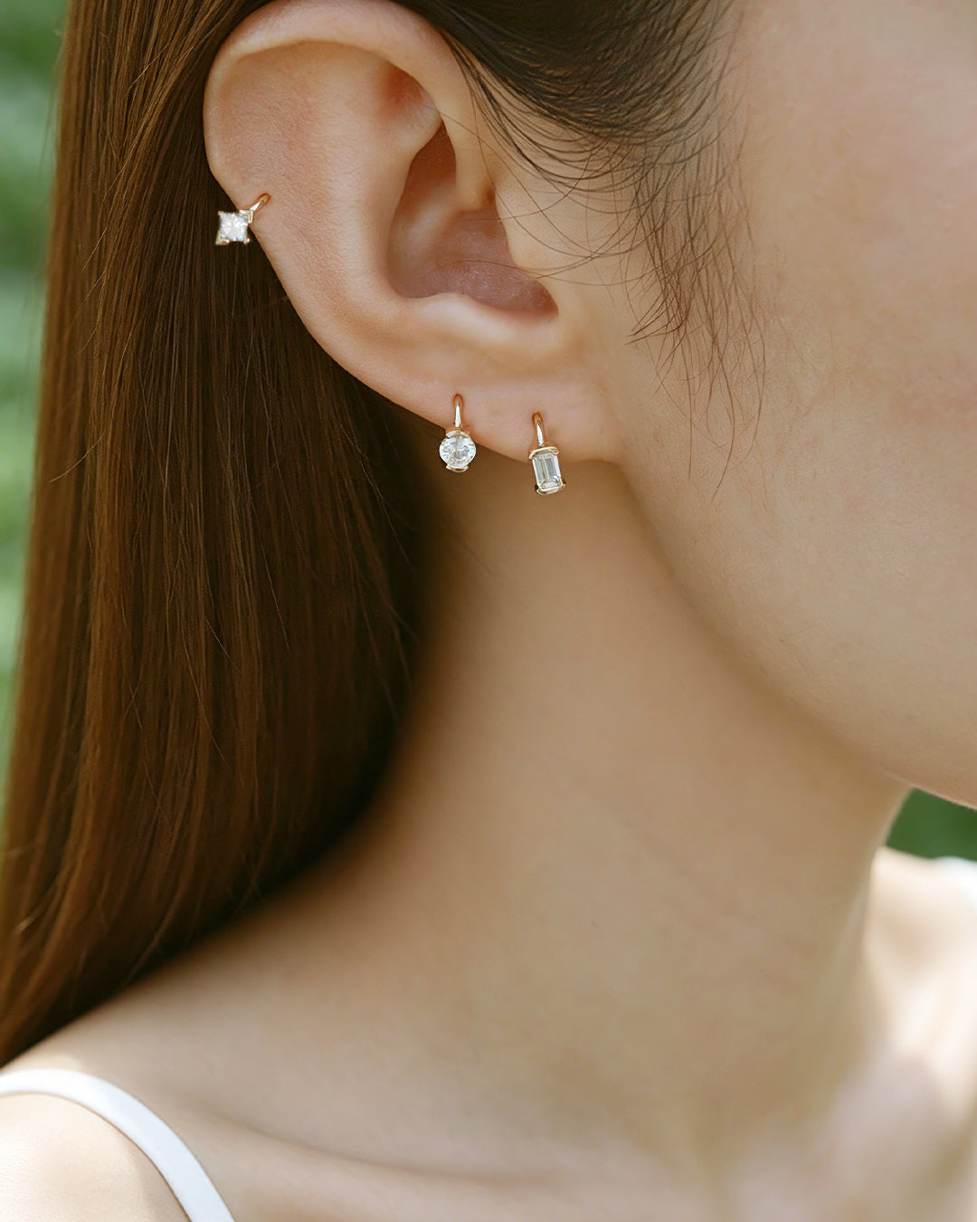 The Radiance Emerald Diamond Huggie Hoops