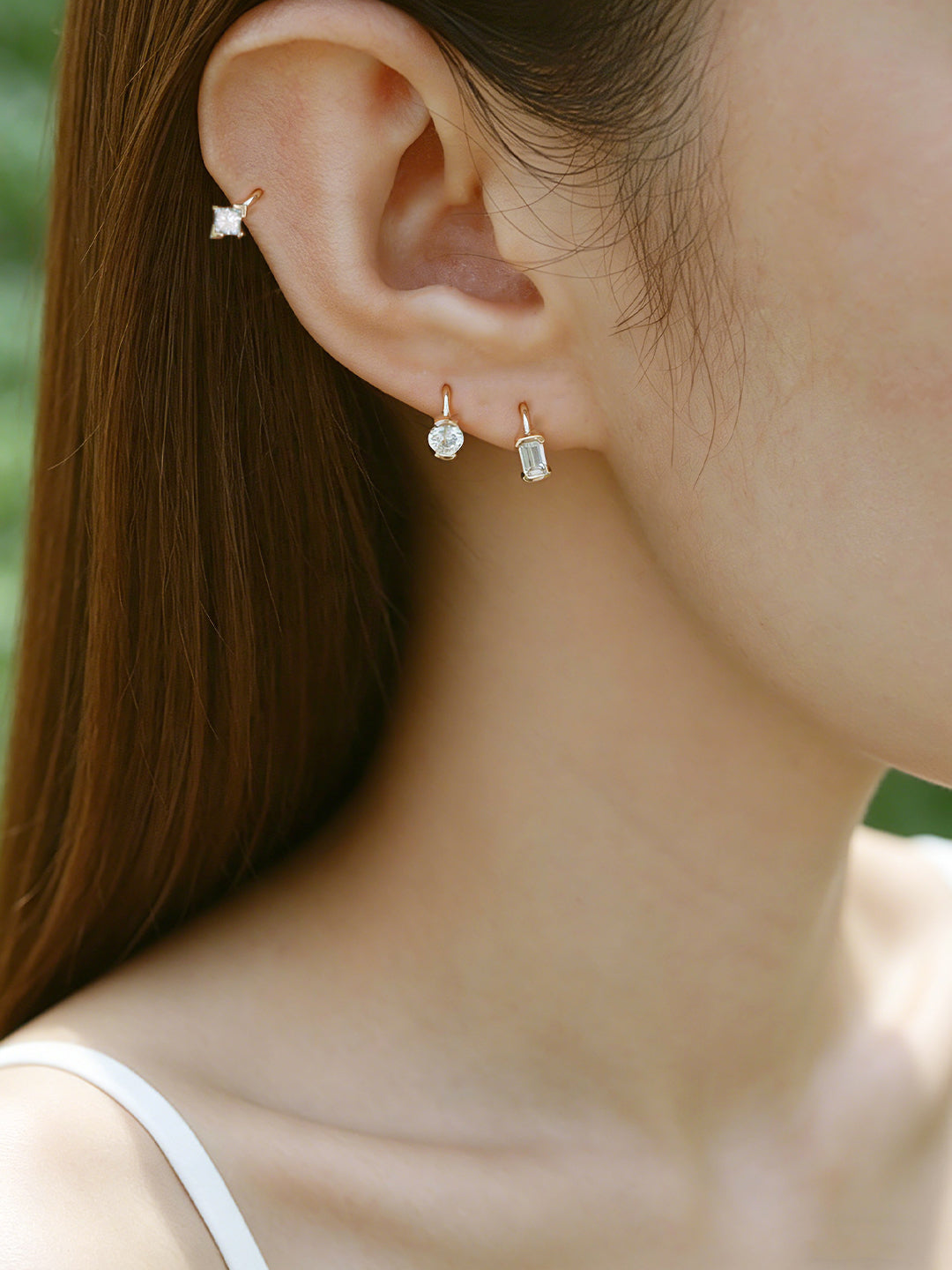 The Radiance Emerald Diamond Huggie Hoops