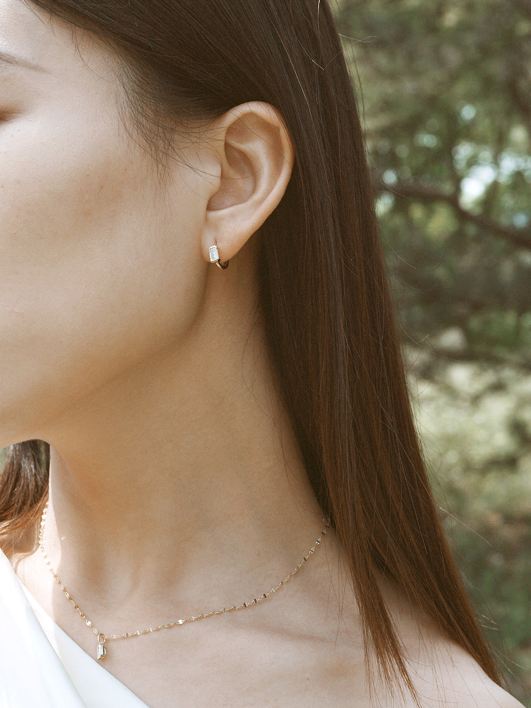 The Radiance Emerald Diamond Huggie Hoops