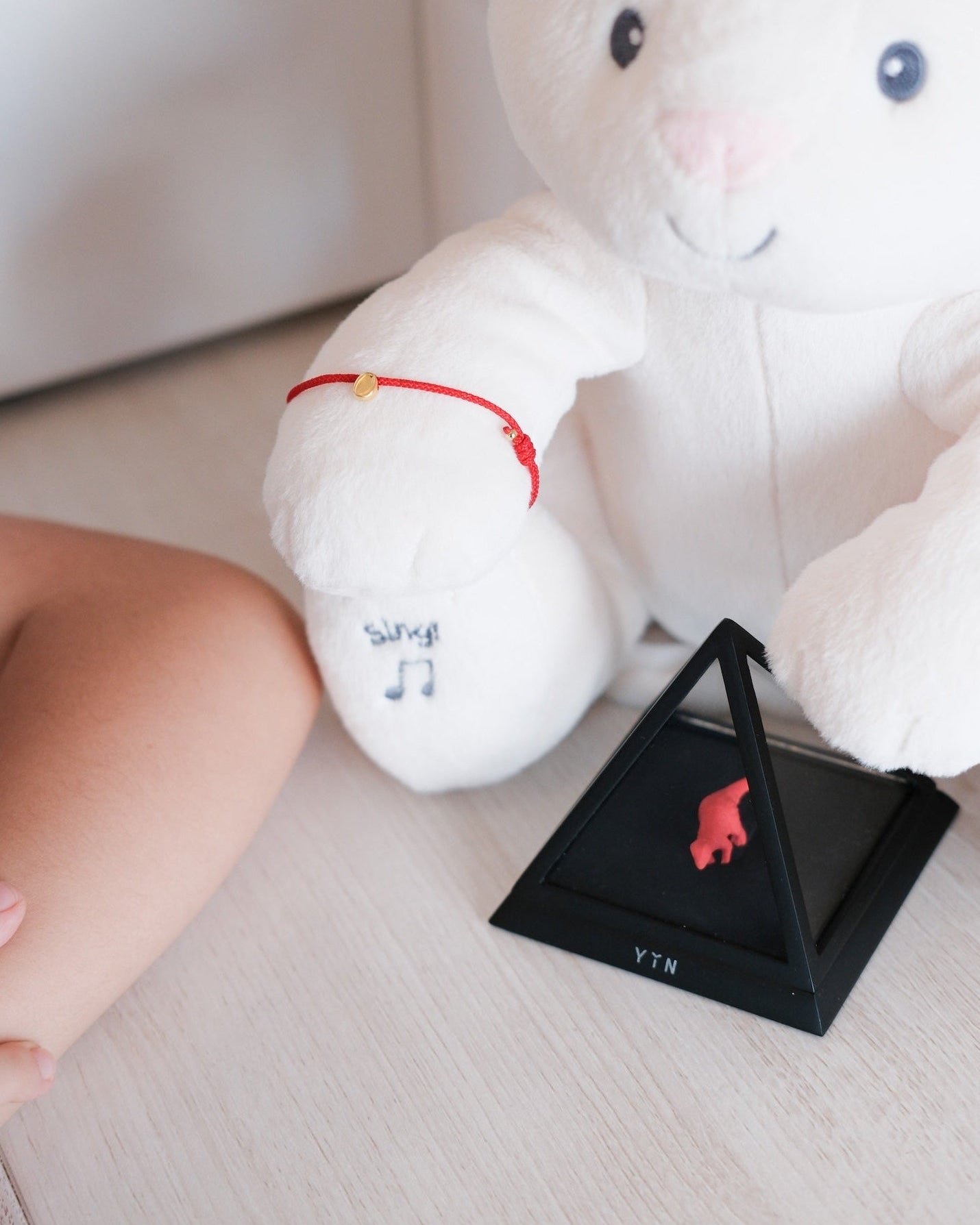 The Seed Adjustable Red Cord Baby Bracelet